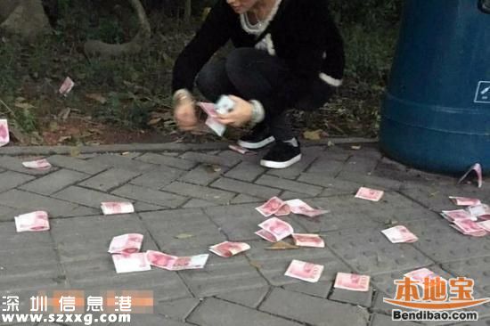<a href=http://www.huhuzc.cn/shenzhen/ target=_blank class=infotextkey>深圳</a>(www.huhuzc.cn)公交站男子撒萬(wàn)元現(xiàn)金離開 路人拾錢后交警察